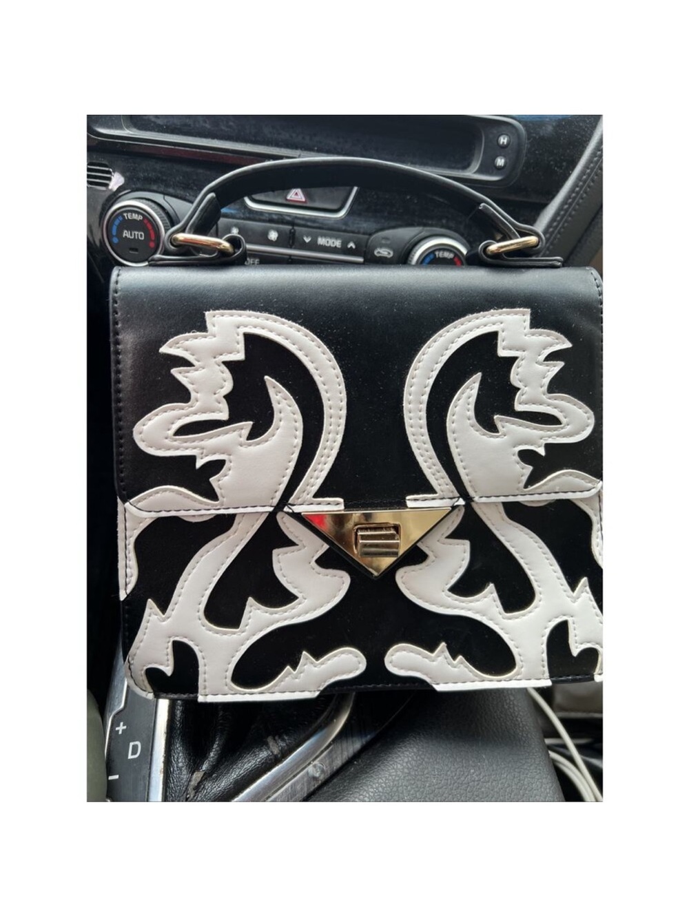 AKIRA Black Shoulder Bag with White Appliqué and Gold Hardware